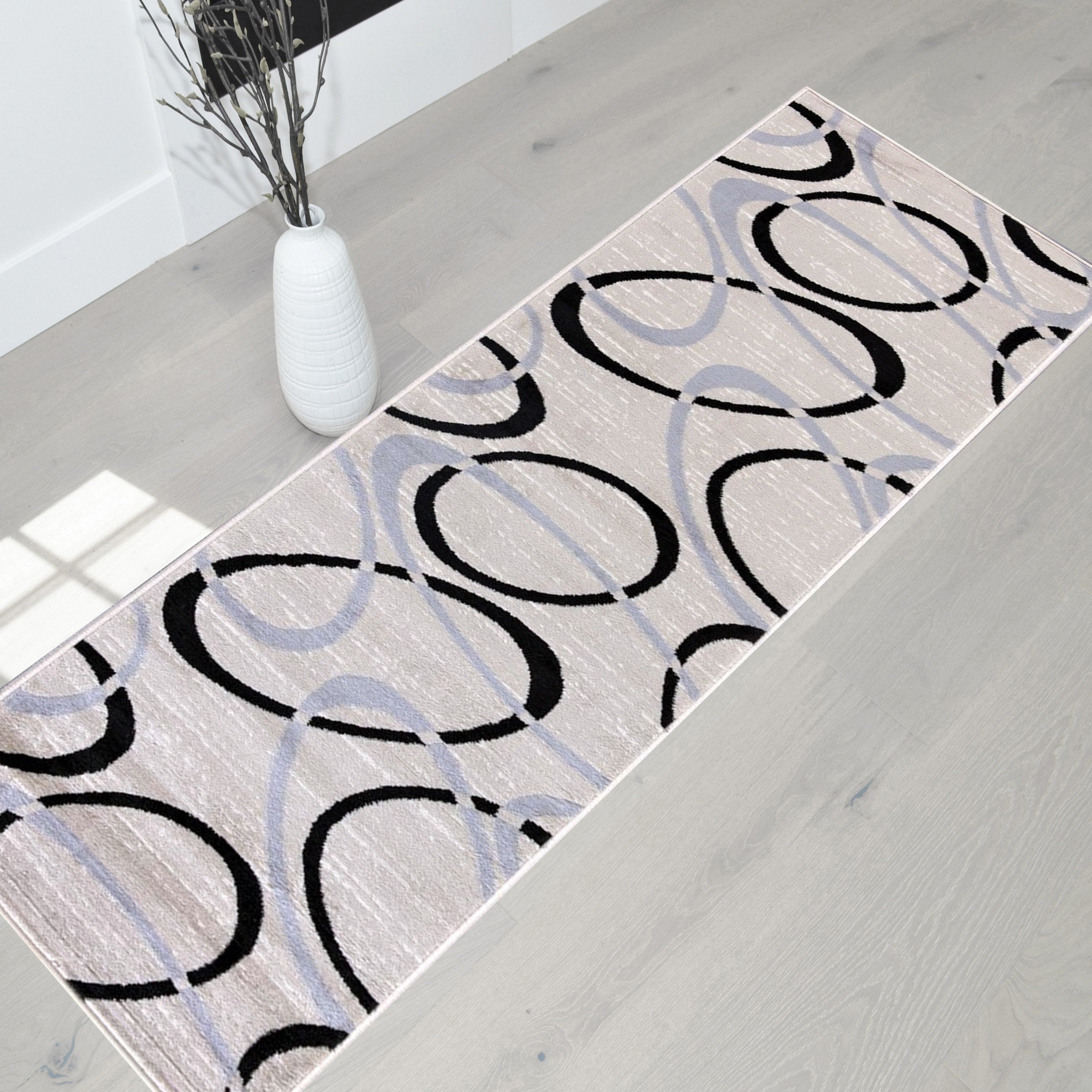 Modern Bohemian Oval Rug - Available in gray, red, beige, and blue.