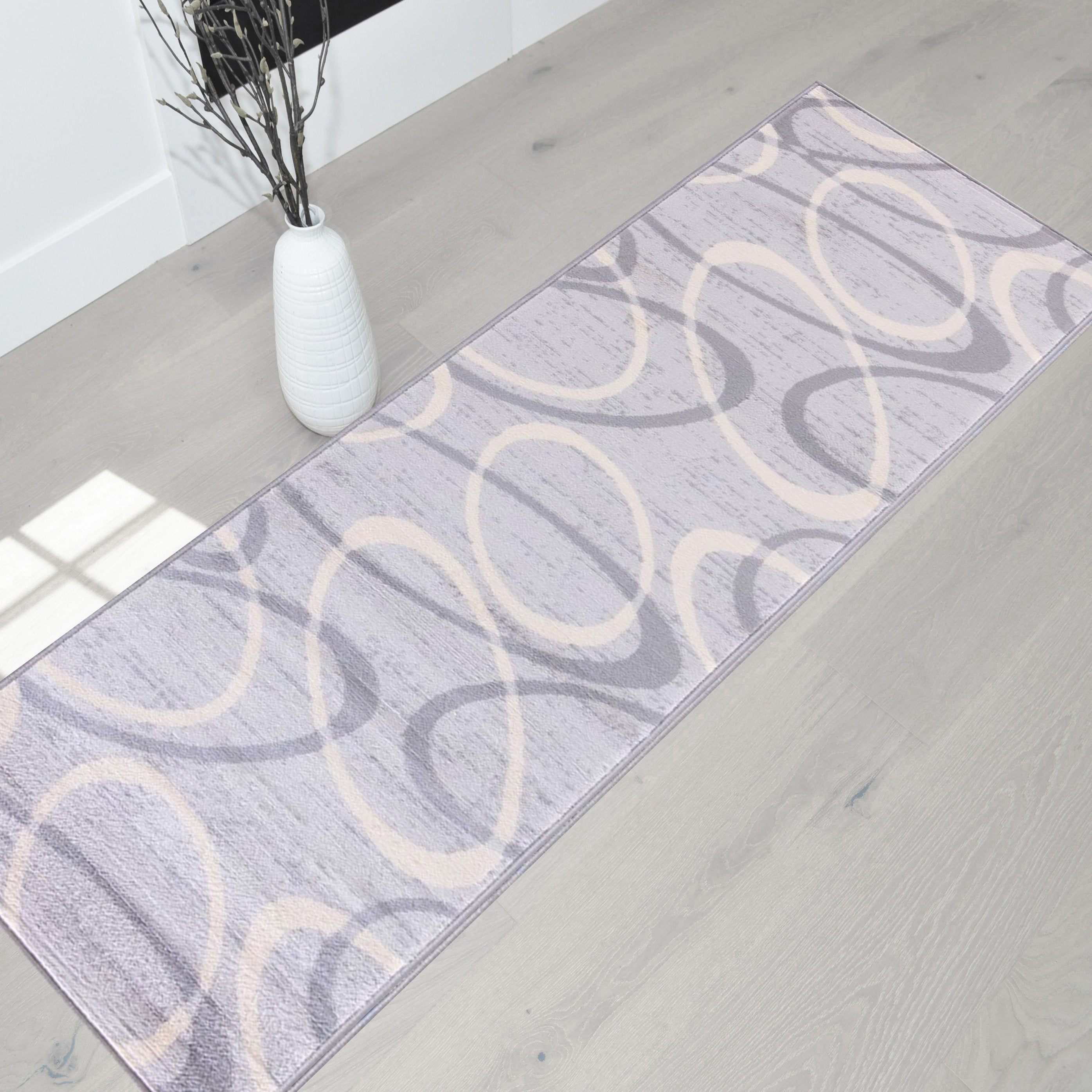 Modern Bohemian Oval Rug - Available in gray, red, beige, and blue.