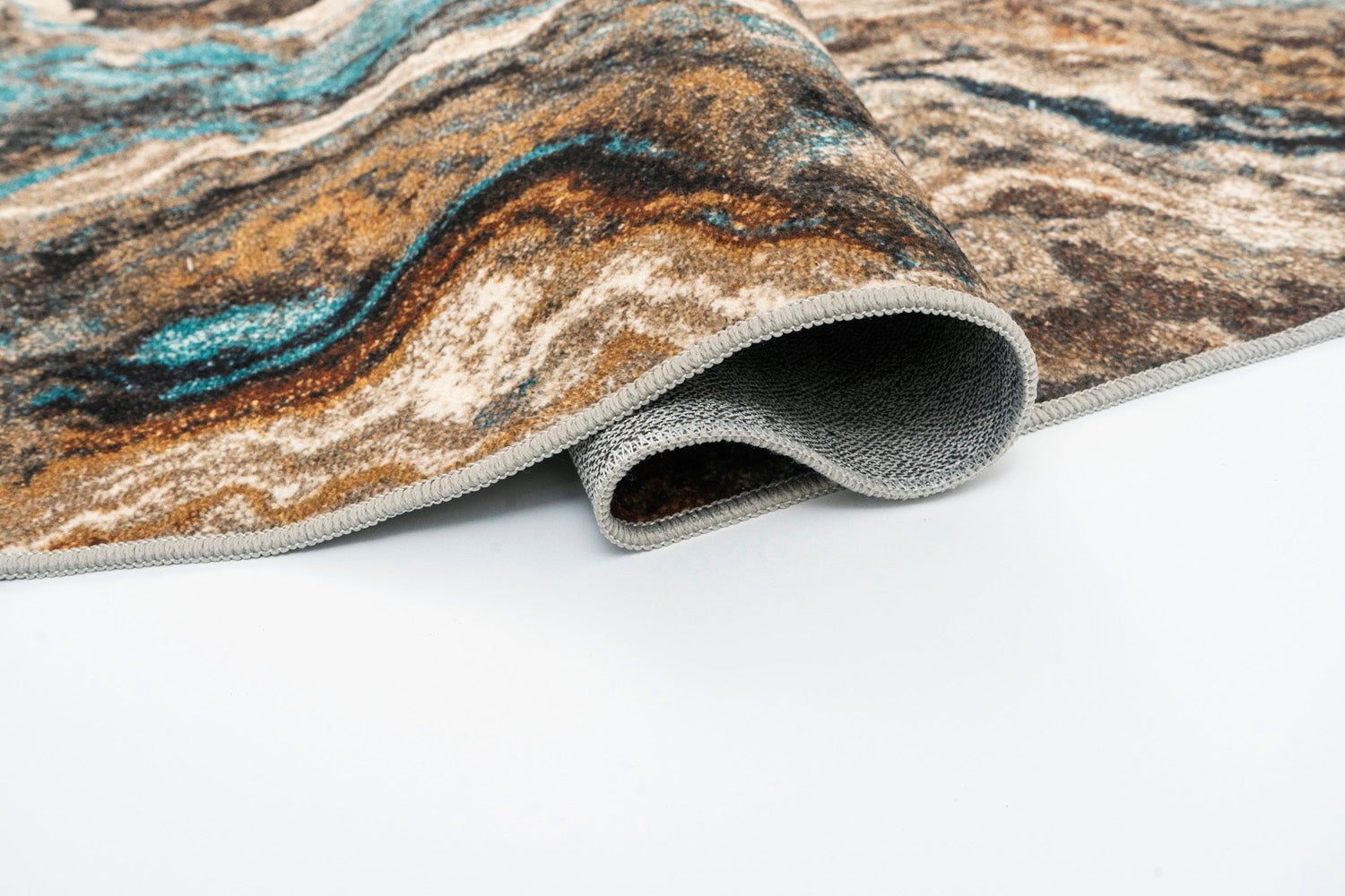 Stylish turquoise and burgundy marble rug. Washable, non-slip, and foldable. Available in 3 sizes. Perfect for any space