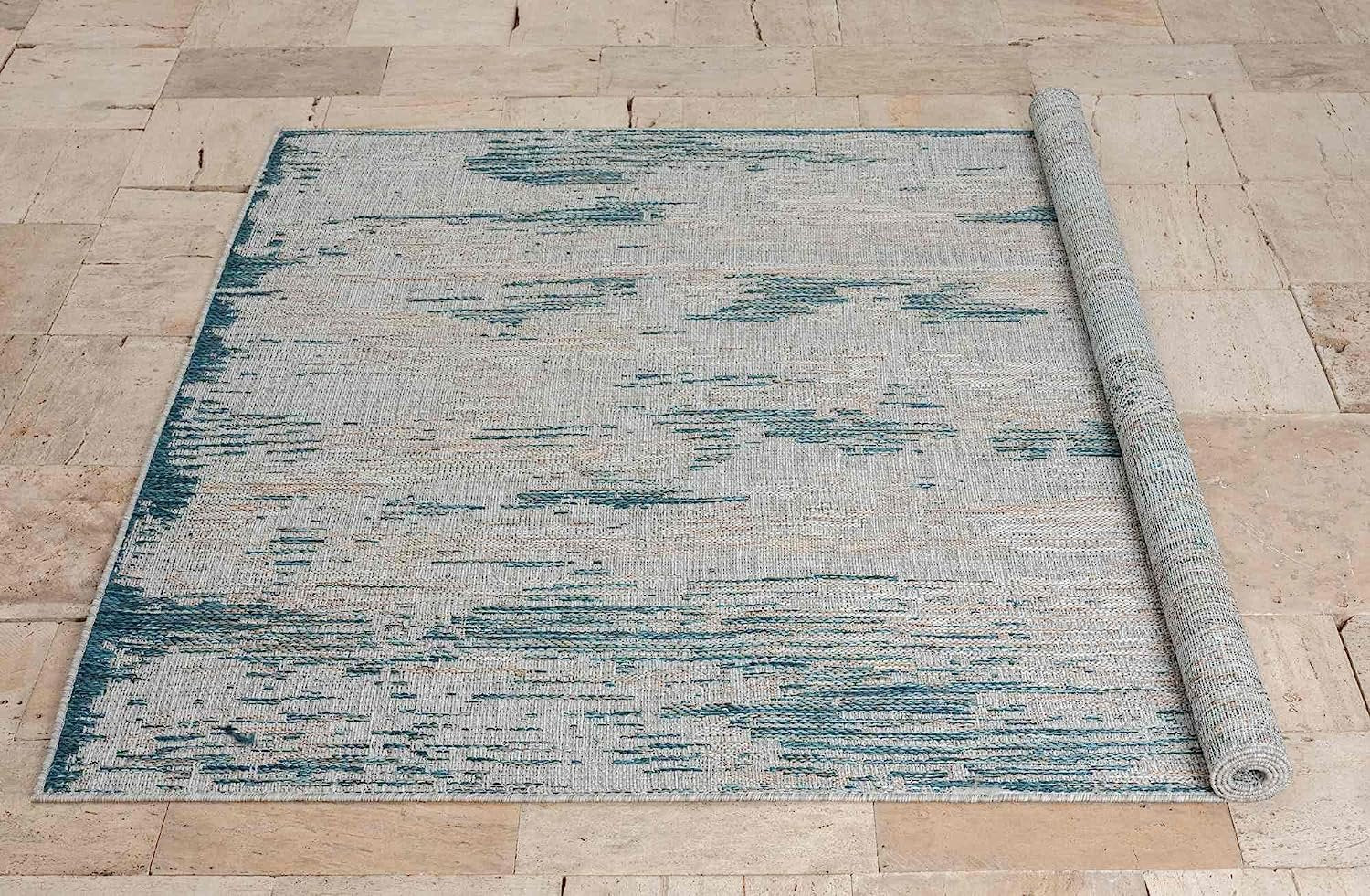 Abstract waterproof outdoor rug with neutral color tones