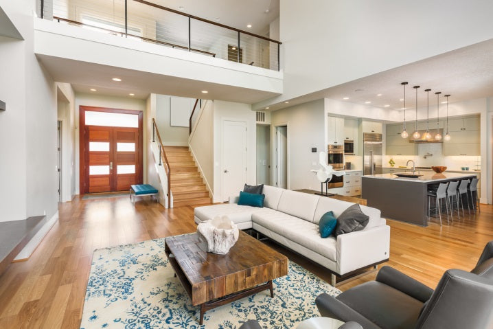 luxury living room with hardwood floors and area rug