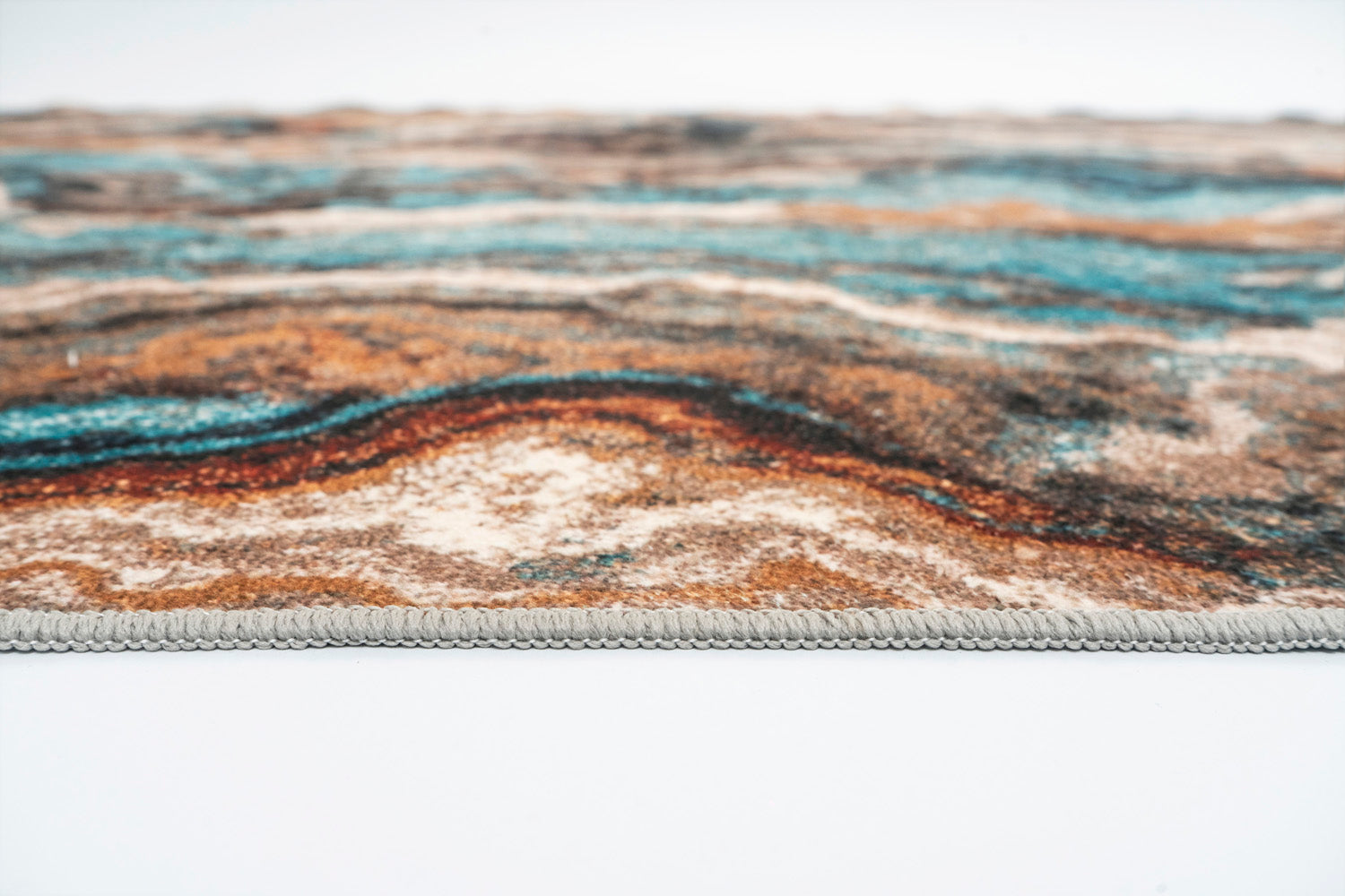 Stylish turquoise and burgundy marble rug. Washable, non-slip, and foldable. Available in 3 sizes. Perfect for any space